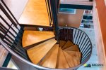 Fun spiral staircase that guides you to a upstairs loft.  